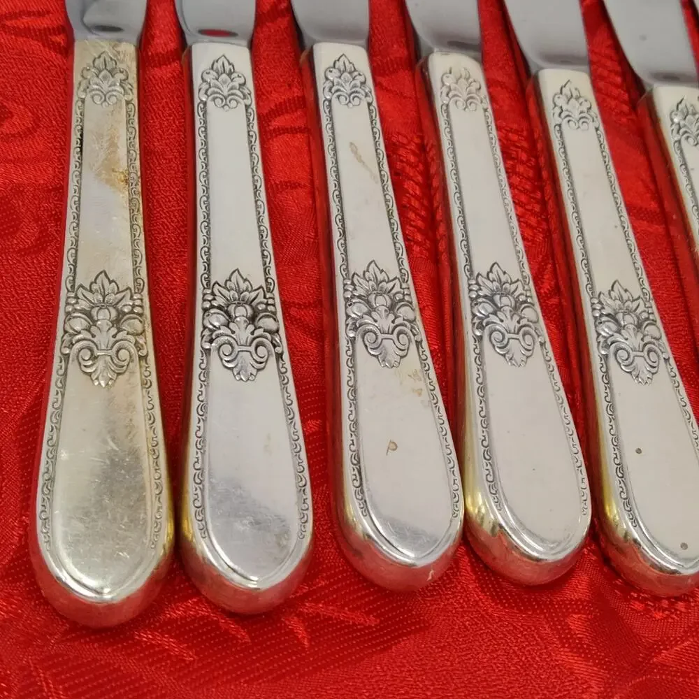 8X BK Rogers Bros ADORATION International SilverPlate Butter Knives